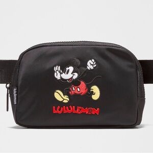 Brand New never used!! lululemon Black Belt Bag with Mickey Mouse Design.